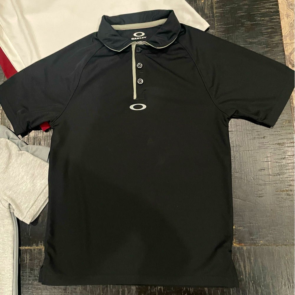 Size 10 Oakley, Polo, dri-fit, perfect condition.